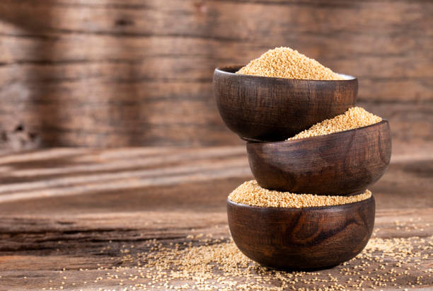 istock Amaranthus - Amaranth seeds in wooden bowls 1215226219