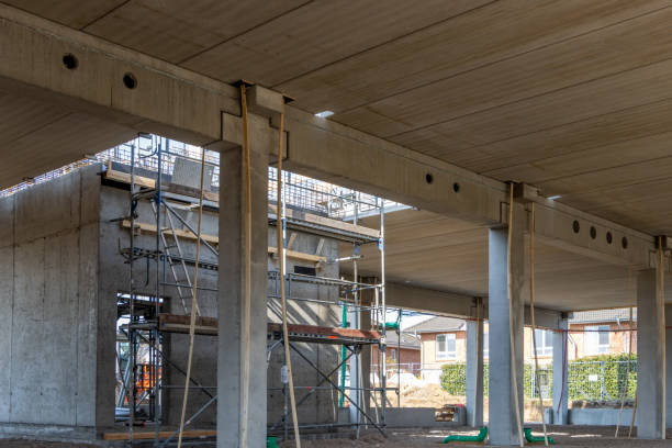 istock huge company building is erected on a large construction site 1215226322
