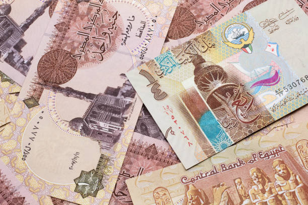istock A dinar bank note from Kuwait with Egyptian one pound bank notes 1215226958