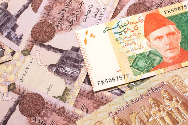 istock A Pakistani rupee bank note with Egyptian one pound bank notes 1215228612