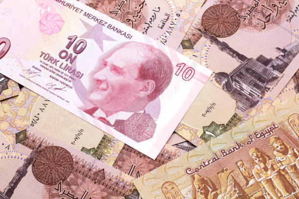 istock A Chinese one hundred yuan note on a background of Egyptian pound bills 1215228670