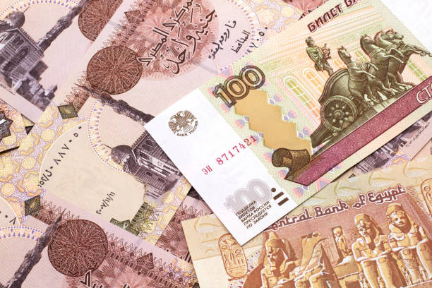 istock A Russian ruble bank note on a background of Egyptian pound 1215228837