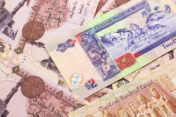 istock A two dollar bill from Belize with Egyptian one pound bank notes 1215229042