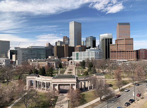 Denver skyline with Civic Center Park in foreground and view of Voorhies Memorial and the Greek amphitheater
