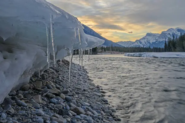 Ice on the banks of the Bow River at Canmore, Alberta, Canada