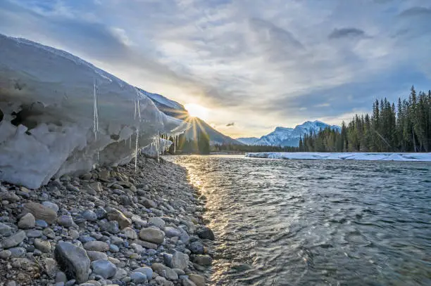 Ice on the banks of the Bow River at Canmore, Alberta, Canada