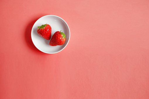 Strawberries on a small plate. Vitamin c, nutrition, health, etc.