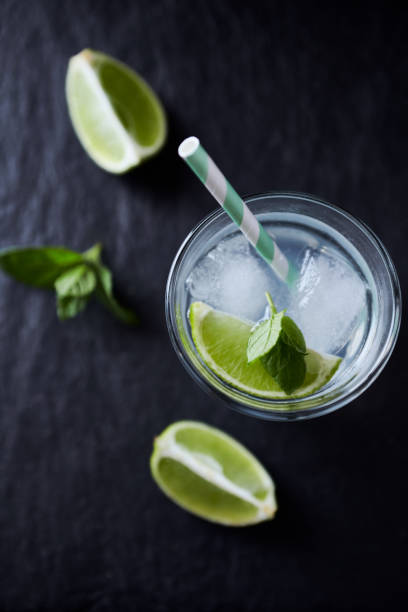 istock Gin and Tonic on black stone background. Close up. 1215241801