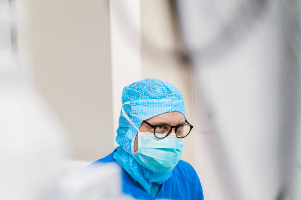 Healthcare worker in protective clothing during medical crisis of covid 19 virus outbreak