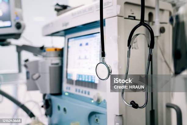 Stethoscope Next To Medical Ventilator In Emergency Room Stock Photo - Download Image Now