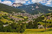 Ortisei in Idyllic Dolomites alps landscape – Val Gardena, Italy