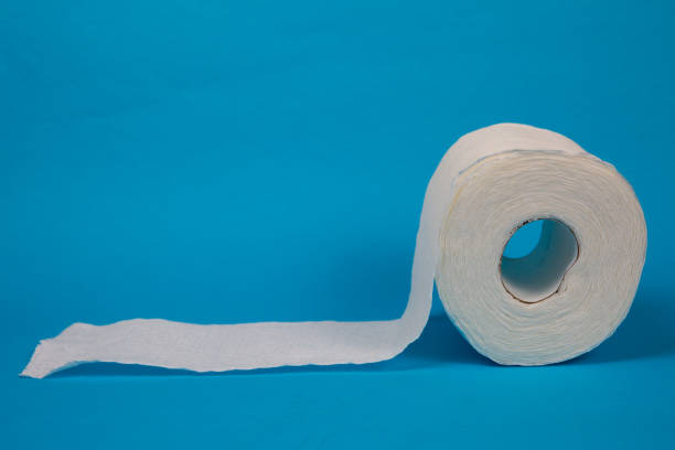 istock Toilet Paper on Blue Background 1215246556