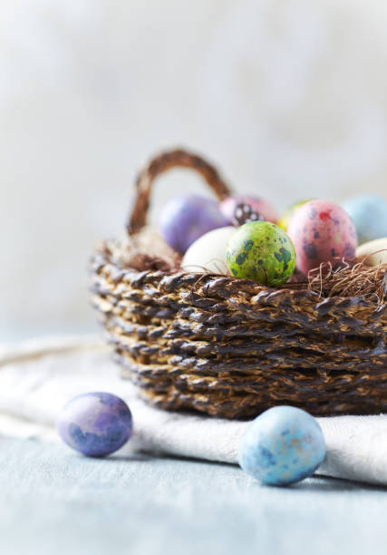 istock Basket of Colorful Eggs for Easter 1215247481