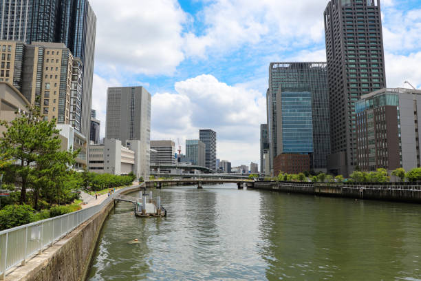 istock River flowing through the city 1215247547