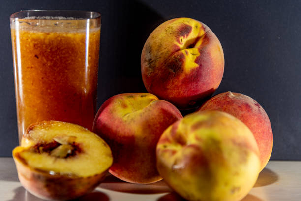 istock Peach juice and fruits (scientific name Prunus persica) 1215247670
