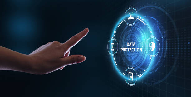 istock Business, technology, internet and networking concept. Young businessman working  in the office, select the icon Data protection on the virtual display. 1215248478