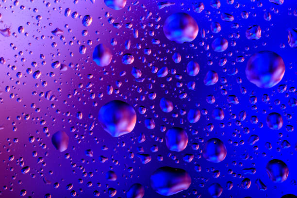 istock Backgrounds Condensation Blue Pink Raindrop Water Wet 1215250288