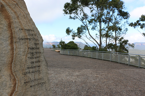 Quote found on the right hand side of the Echo-Point lookout, Katoomba, Blue Mountains, Australia. 'An immense gulf is unexpectedly seen through trees. This kind of view was to me quite novel and extremely magnificent.' Charles Darwin, The Voyage of the Beagle (1836)