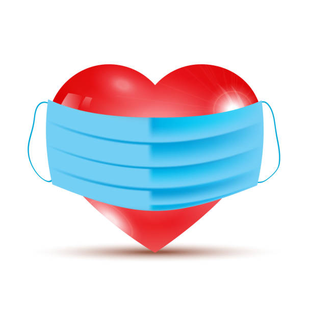 istock COVID-19 banner with the heart protected by mask 1215251935