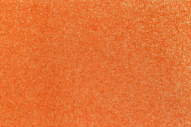 istock Orange glitter shiny texture background for christmas, Celebration concept 1215253516