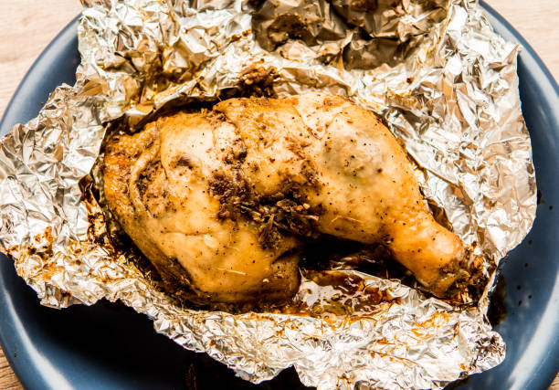 istock Roasted chicken and herbs in plate 1215253547