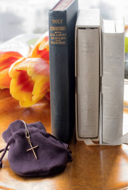 istock Gold Cross Necklace Gift with religious Books 1215253549