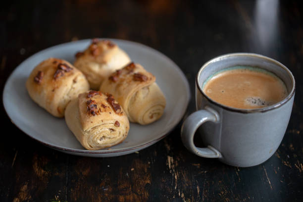istock homemade walnut rolls and coffee break 1215253618
