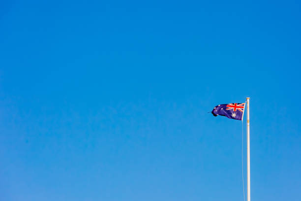 istock national flag over blue sky, australia, 1215254676