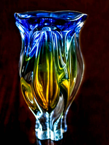istock old colored Czech glass vase on a dark background 1215260181