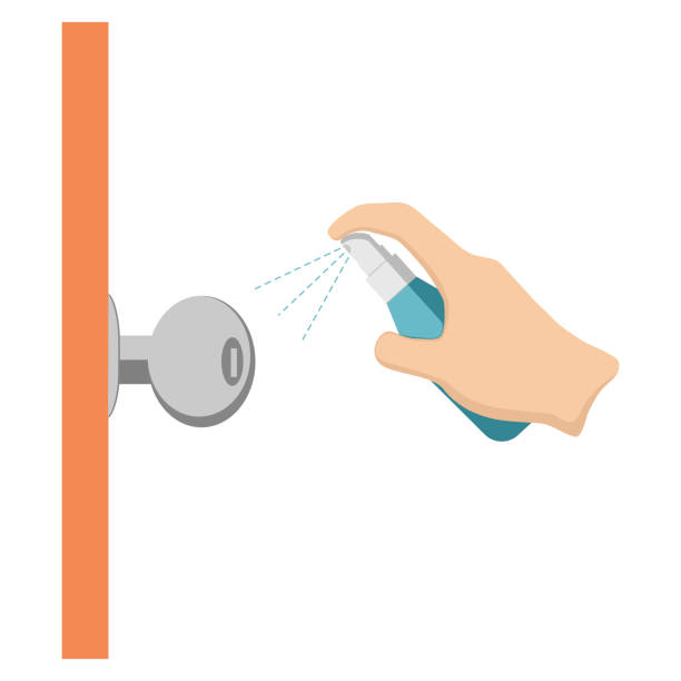 Clean the doorknob with alcohol spray. Clean the doorknob with alcohol spray. Flat design vector. door handle stock illustrations