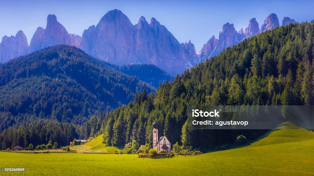 St Johann Church in Santa Maddalena, Dolomites Alpine landscape – Italy Agricultural Field Stock Photo