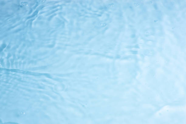 istock texture of splashing clean water on pastel background 1215261677