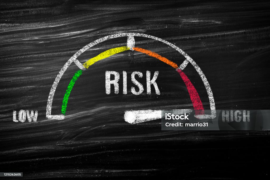 High risk meter High risk meter on blackboard Risk Stock Photo