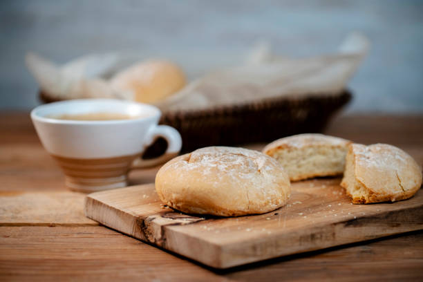 istock homemade breakfast: homemade whole wheat bun and coffee 1215264151
