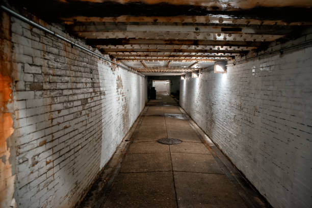istock Dark and scary underground tunnel at night 1215267769