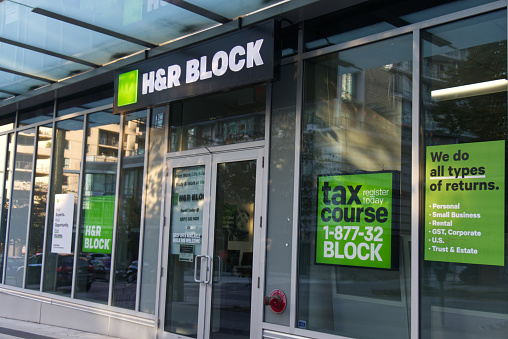 Vancouver, Canada - October 5, 2019: Street View of entrance H&R Block - tax preparation company in Downtown Vancouver