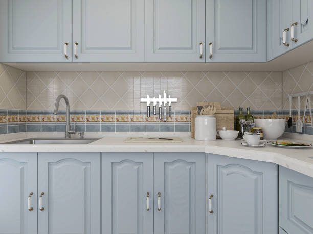 istock 3D rendering,Modern family kitchen design, new cabinets and kitchenware with refrigerators, sunlight from the window. 1215272642