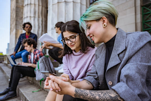 istock University students on stairs 1215274139