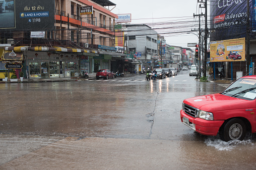 Udon Thani, Thailand, august 28, 2019, street scene in udon thani, thailand with heavy rain in the rainy season.