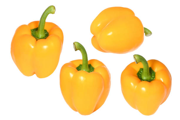 istock Selective focus fresh  yellow bell pepper or sweet pepper or capsicum on white background isolated and clipping path. Food popular in many different cuisines.Vegetable ingredient concept. 1215275128