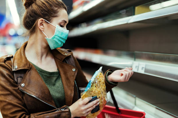 istock She got lucky to find some groceries in an empty store! 1215277604