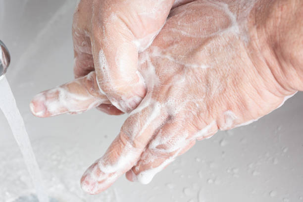 istock A man washing his hands 1215279526