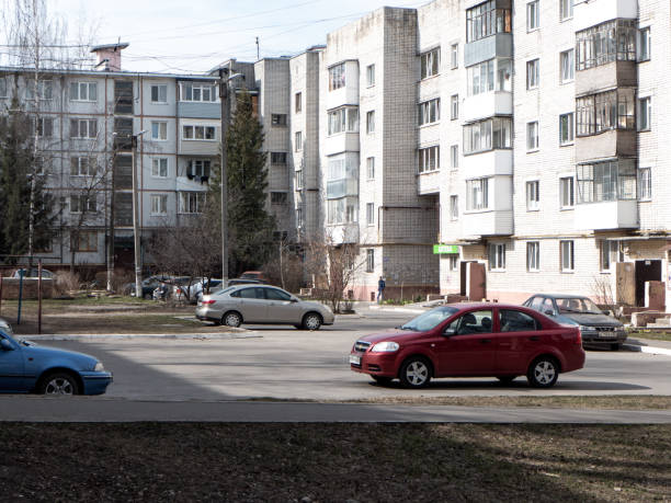 Moscow, Russia - March 27, 2020: Cars parked next to apartment block