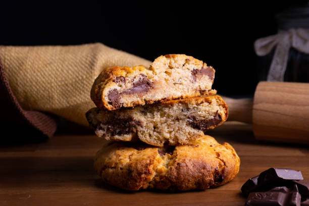 istock Two delicious cookie cakes with chocolate on a wooden board with copy space 1215285385