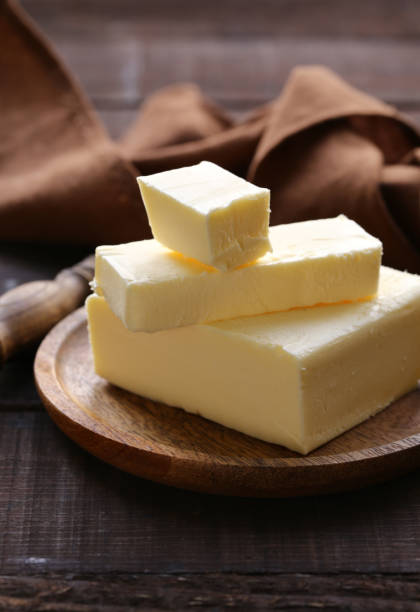 organic butter for breakfast - margarine dairy product butter close up imagens e fotografias de stock