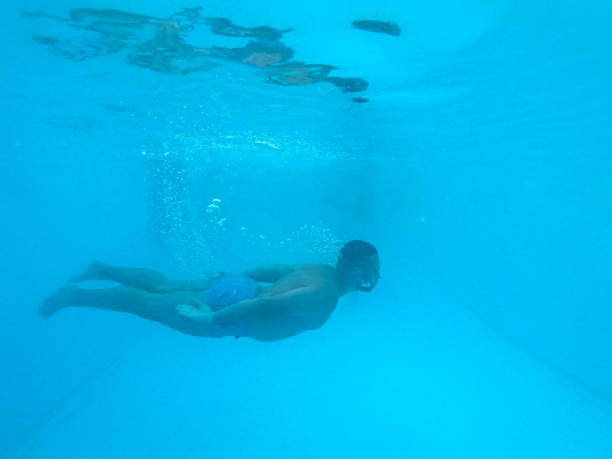 istock Underwater in swimming pool 1215292308