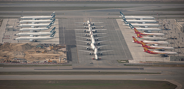 March 16, 2020, Hong Kong: Aircrafts are seen lined up on the tarmac at Hong Kong International Airport.