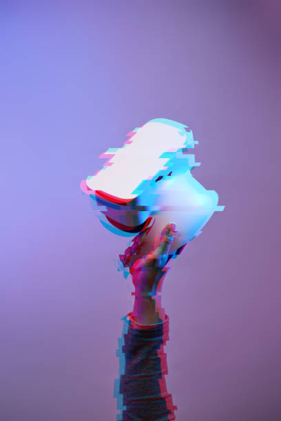 istock Hand with virtual reality headset. Technology of future. Image with glitch effect. 1215294998