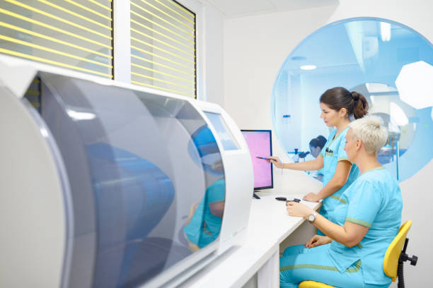 istock Medical research at the lab. Scientist in laboratory working with medical samples  using modern equipment. Laboratory Medical Equipment Medical devices for analyzes. Blood tested for Coronavirus (COVID-19),  Cancer. definition of DNA, virus, 1215301289