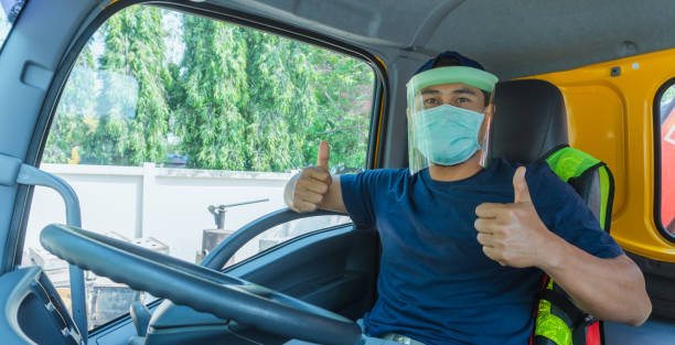 istock Truck driver wearing a mask 1215302055